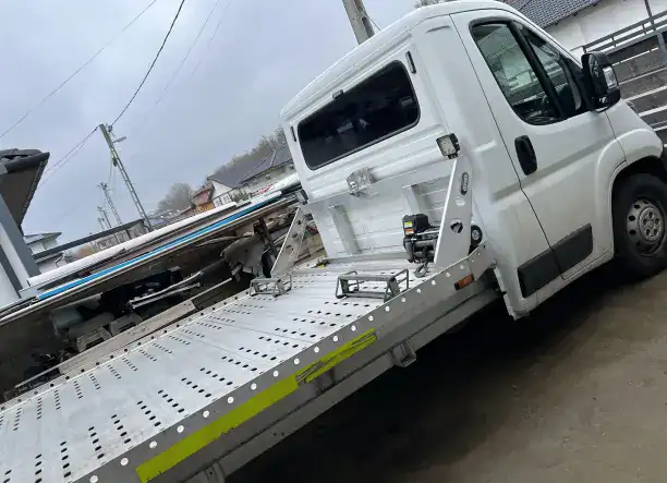 autómentés, autószállitás