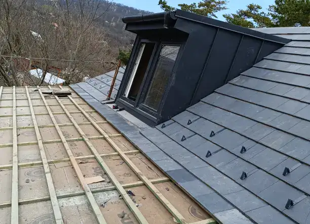 Ács és bádogos mester